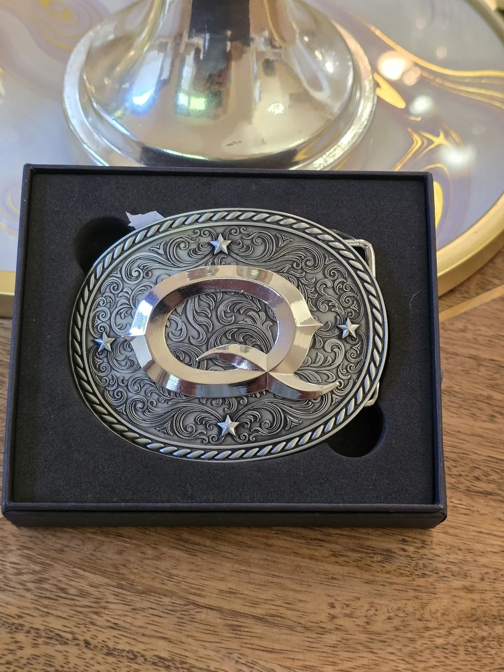 Silver and Black 'Q' Decorative Belt Buckle